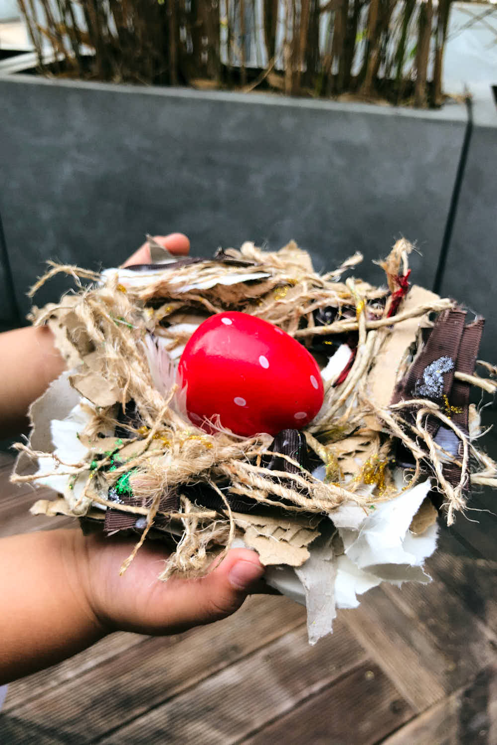 Making a bird nest craft - final nest made by my kid