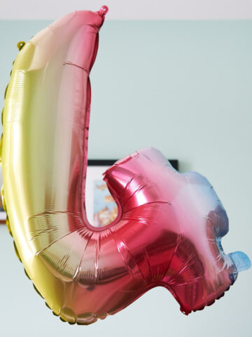 Giant number balloon hanging for a fun birthday morning idea